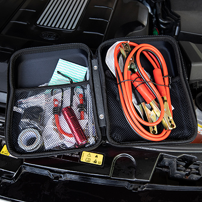 LIFELINE<sup>&reg;</sup> Emergency Roadside Kit - This compact, 35-pc emergency kit will help with those unexpected automobile issues.  Kit contains carry bag, booster cables, 9 LED alumunim flashlight, 3 AAA batteries, 2-in-1 screwdriver, pair of nitrile gloves, bungee cord, roll of duct tape, emergency poncho, 2 shop cloths, 6 cable ties, reusable zipper-lock bag, and adhesive bandages.